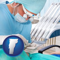 vt map icon and an oral surgeon operating on a dental patient