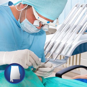 an oral surgeon operating on a dental patient - with Alabama icon