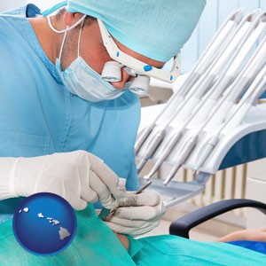 an oral surgeon operating on a dental patient - with Hawaii icon